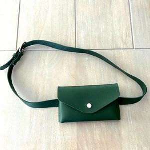 Small green everywhere belt purse.
